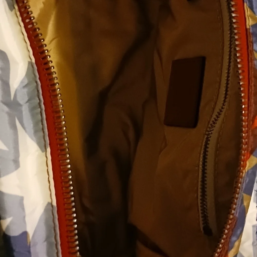 Valentino Garavani pouch.